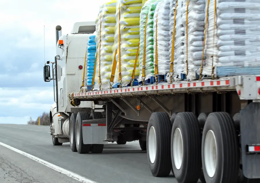 Colourful cargo truck in motion