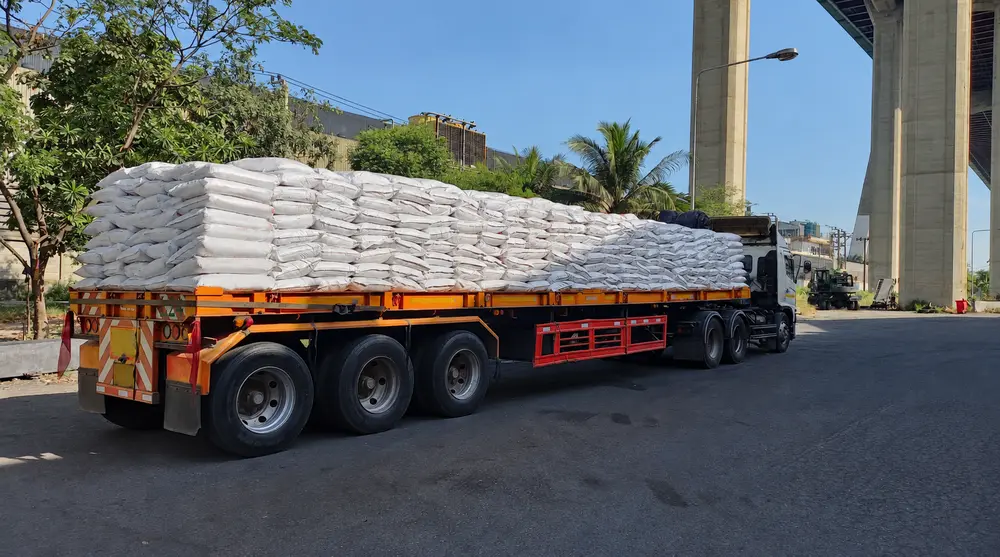 Loaded flatbed truck in NSW, where load restraint offences carry NHVR fines and penalties