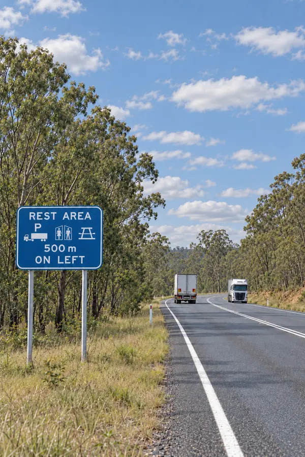 Heavy vehicles parked at a truck rest area